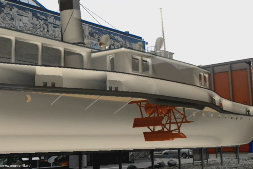 The full-size model of a ship with a historic representation of what that type of ship looked like many years ago at the Museum of Transport in Lucerne. The overlay is created live, visible to the person wearing the HoloLens.